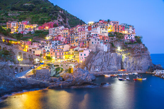 Colorful villages in Cinque terre, Italy and seascape at sunset