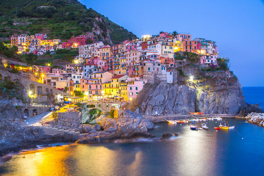 Colorful villages in Cinque terre, Italy and seascape at sunset