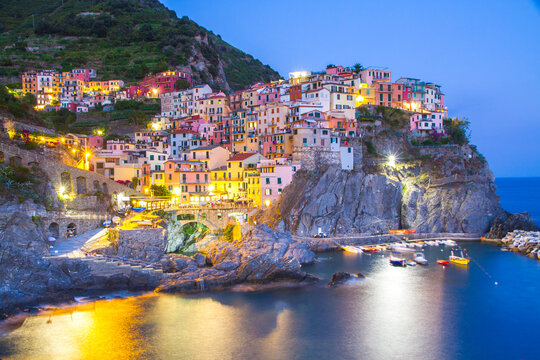 Colorful villages in Cinque terre, Italy and seascape at sunset