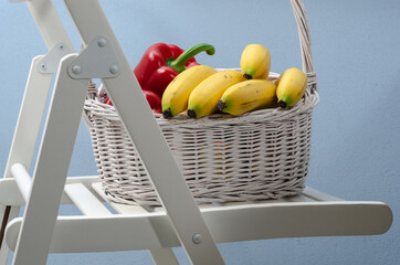 A basket full of vegetables and fruits