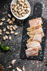 Dried fish on a wooden background. Different kinds of dried fish