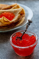 Russian traditional Maslenitsa: pancakes with red caviar