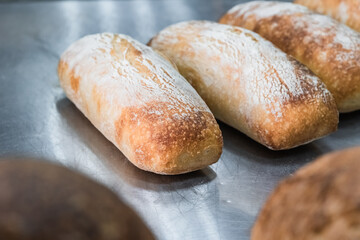Craft bread on the table at the bakery. The concept of small industries and healthy food