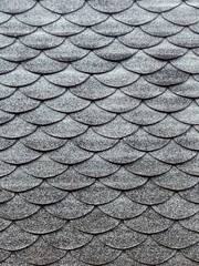 Dark gray tilling roof texture. Building materials.