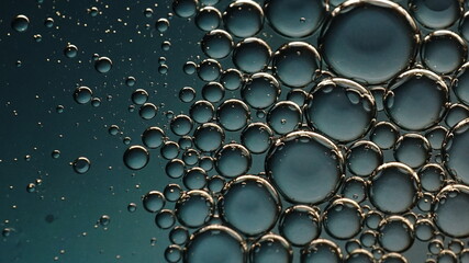 Oil bubbles in the water with some gradient backlight