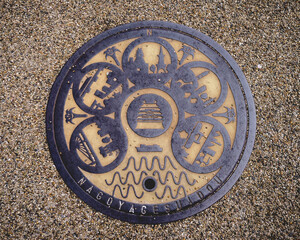 Nagoya Castle traditional sewer cover (manhole) with beautiful design of Nagoya city, Japan