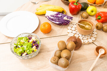 healthy foods are on the table in the kitchen