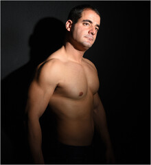 Fototapeta premium a muscular man with shadows 