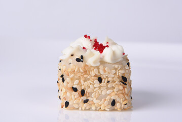 japanese sushi with sesame seeds and cream
