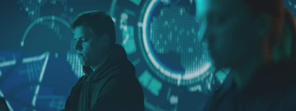 IT computer specialists in the modern workspace. High technology concept.