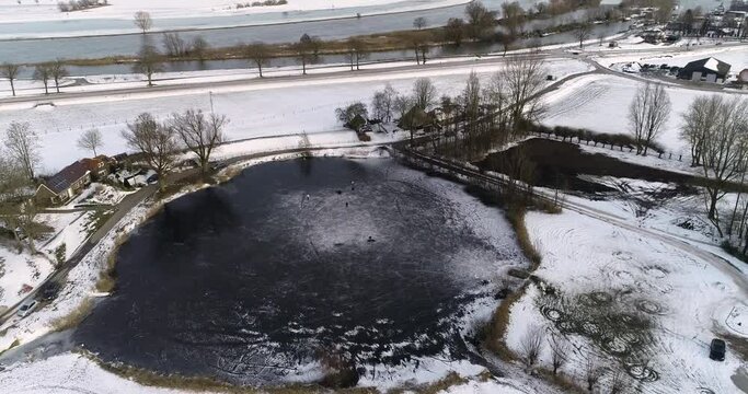 Drone footage from guys playing ice hockey on a lake in The Netherlands.