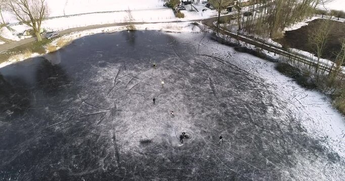 Drone footage from guys playing ice hockey on a lake in The Netherlands.