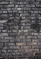 Aged grungy coarse stonework city.Damage front decor cellar house.