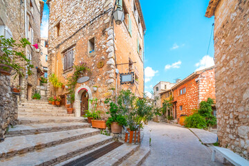 A picturesque back street in the medieval village of Tourrettes Sur Loup in the Alpes_Maritimes area of Southern France.