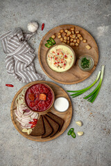 Beetroot red Ukrainian borsch and creamy chicken soup with grilled vegetables. Balanced tasty diet food. First course