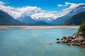 Dart River view with snow-capped mountains in the background at Isengard Lookout, a very remote...