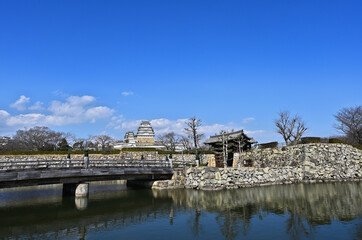 Fototapeta na wymiar 世界遺産の姫路城と桜門橋