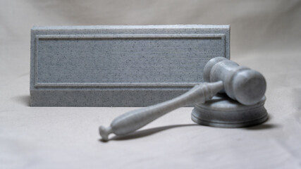 Isolated blank nameplate with a gavel