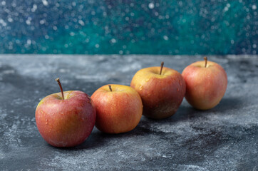 Set of fresh red yellow apple on marble background