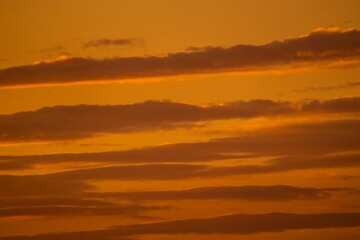 This image shows a hazy orange cloudscape sky.