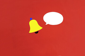 The bell is yellow, the oval for the text is white on a red background. Important information.