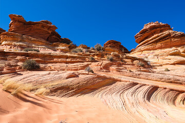 The beautiful landscape and rock formations of Coyote Buttes South in the Vermilion Cliffs National...