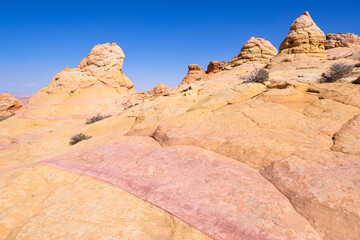 The beautiful landscape and rock formations of Coyote Buttes South in the Vermilion Cliffs National...