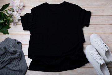 Women’s T-shirt mockup with aran sweater and peony