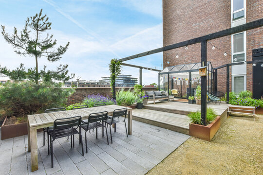 A large open-air terrace on the roof-top with lounge space