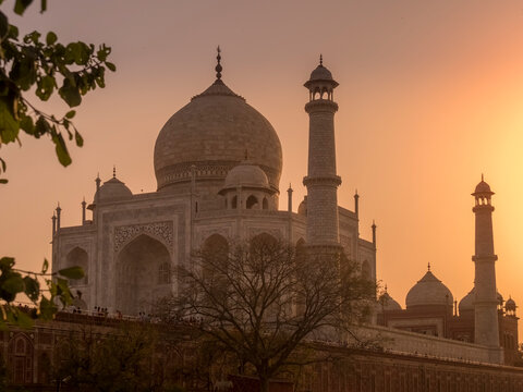 close up of a silhouetted taj mahal at sunset in agra