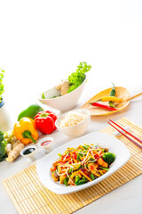 sweet and sour chicken with rice and vegetables