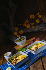 Gratinated Zurich ragout with Brussels sprouts, potatoes and Bearnaise sauce