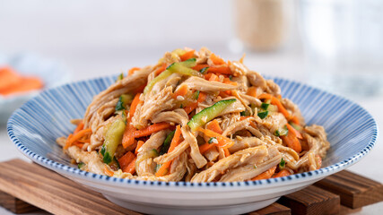 Homemade delicious cold dish of shredded chicken with soy sauce