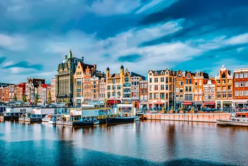 Foto auf Glas AMSTERDAM, NETHERLANDS - SEPTEMBER 15, 2015: Beautiful views of the streets, ancient buildings, people, embankments of Amsterdam - also call "Venice in the North". Netherlands © BRIAN_KINNEY