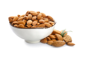 Bowl with healthy almonds on white background