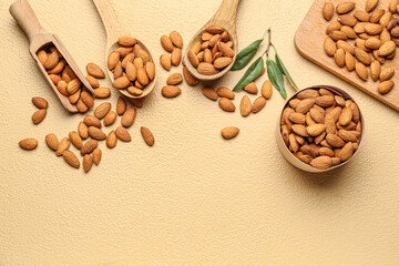 Composition with healthy almonds on color background