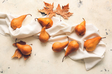 Fresh ripe pears on light background