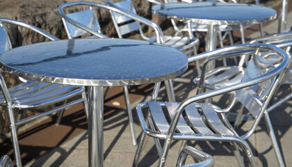 tables and chairs in a park