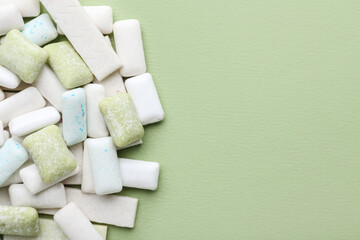 Chewing gums on color background