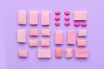 Chewing gums on color background