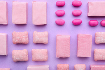 Chewing gums on color background
