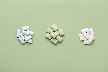 Chewing gums on color background