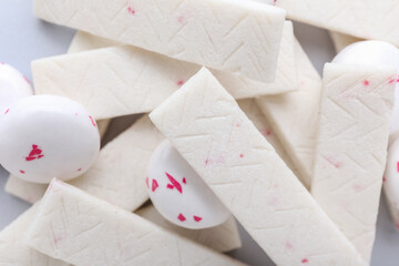Chewing gums on color background