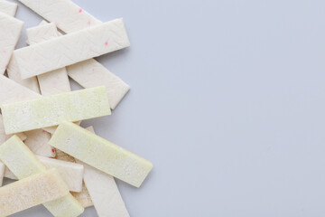 Chewing gums on color background