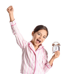 Obraz premium Happy little girl in pajamas and with alarm clock on white background