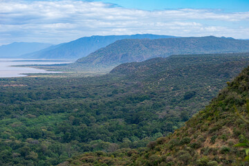 Mountain slopes and Lake Manyara National Park. Arusha, Tanzania. Africa.