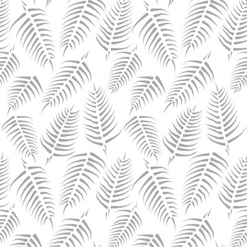 Tropical palm tree leaves. Simple and abstract pattern. Seamless vector pattern. White background. 8 EPS.