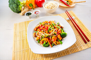 sweet and sour chicken with rice and vegetables
