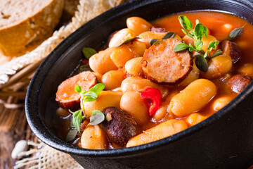 Delicious bean stew with sausage and potato