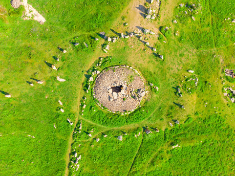 Large Stones In A Field With Round Holes In Karahunj - Armenian Stonehenge, Zorats Karer, Armenia Top View